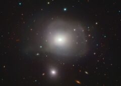 Astronomers discover misshapen galaxy is a cosmic predator that bears ‘scars’ from its last meal (photo)