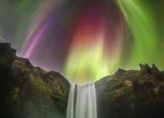 APOD: 2026 August 27 – Colorful Aurora over an Icelandic Waterfall